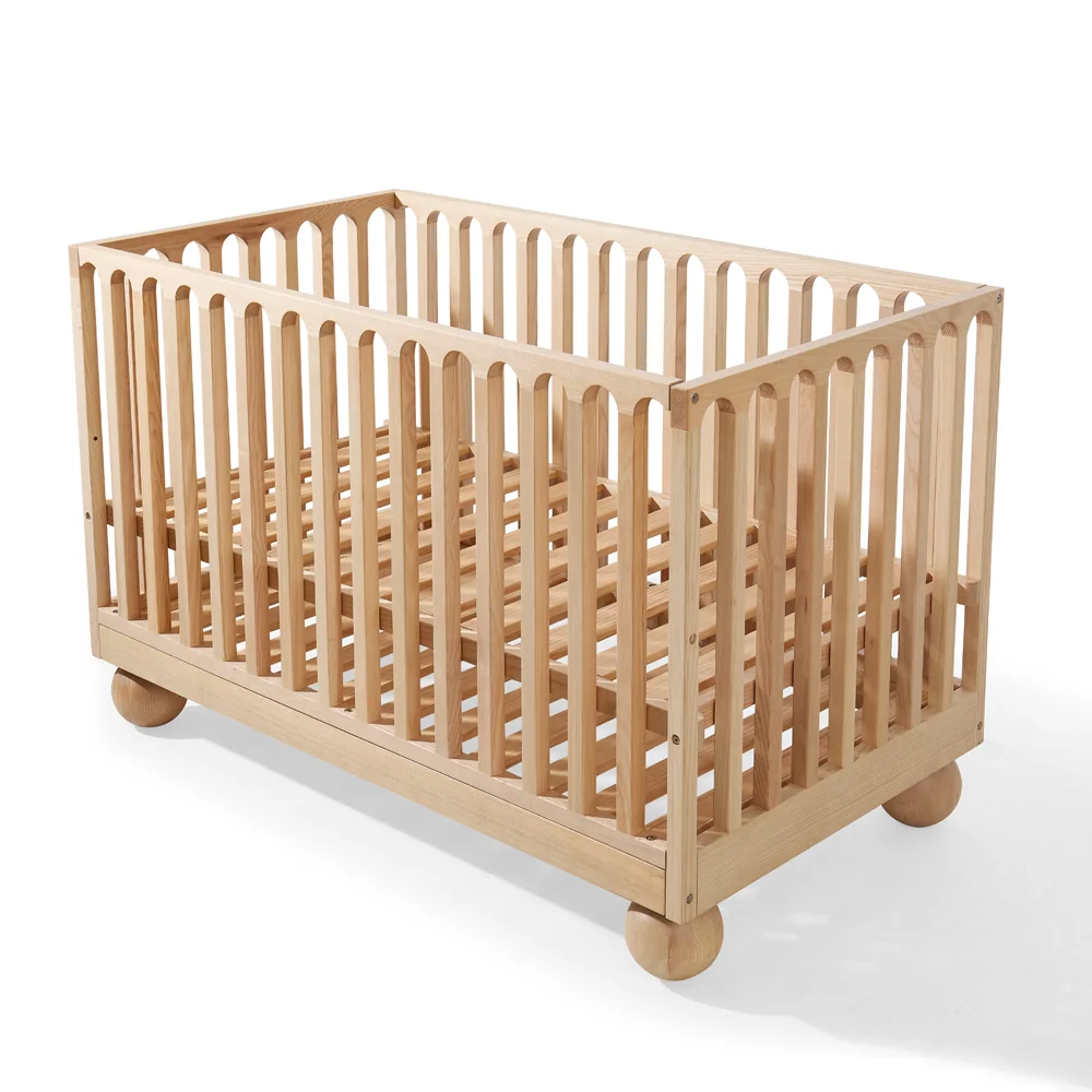 Crib shown from a three-quarter angle